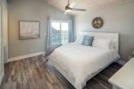 The West main bedroom also features a private deck/ entrance and access to the back patio